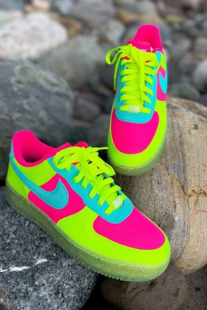 Neon accent performance athletic sneakers.