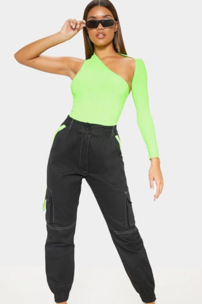 Neon green bodysuit with cargo pants.