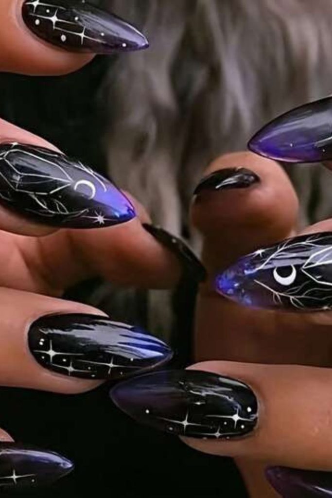 Sheer nails with occult starry tips.