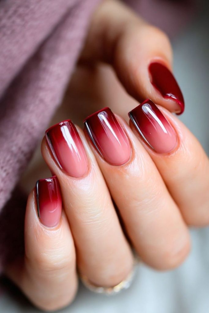 Oxblood nude ombre coffin nails.