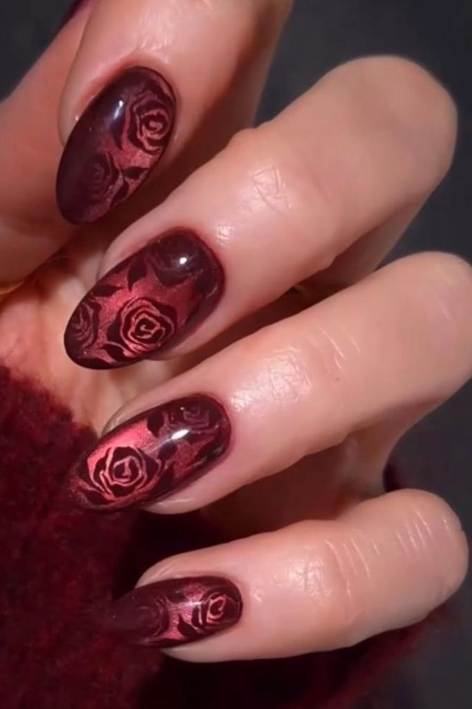 Romantic oxblood rose nail art.