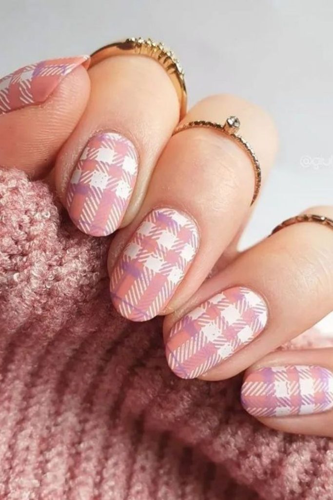 Peachy gingham plaid nail design.