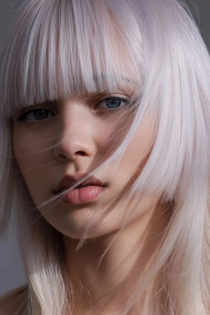 Platinum blonde statement hime haircut.