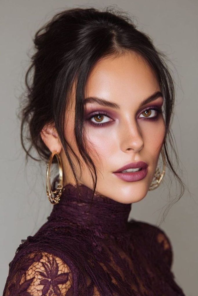 Plum cat eye makeup look.