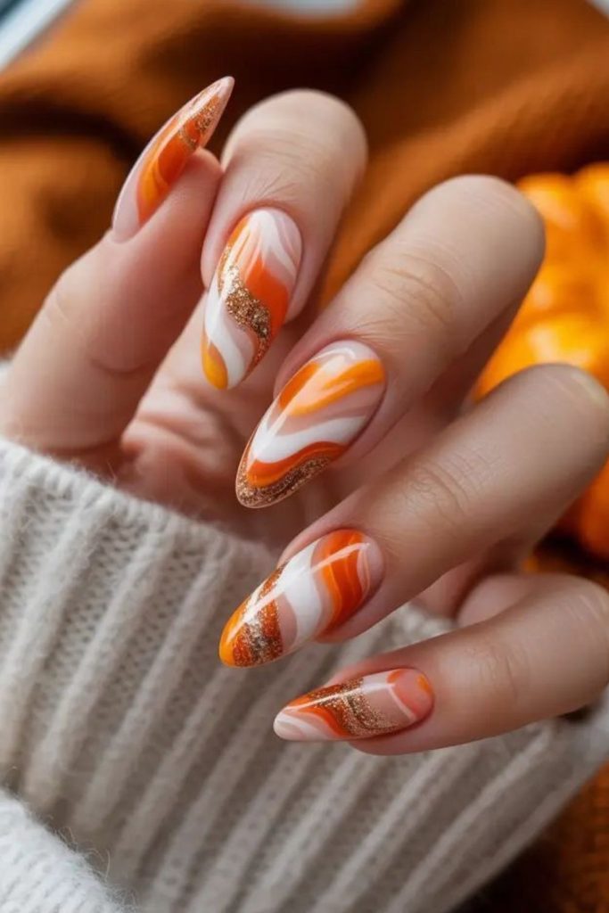 Pumpkin pie swirl Thanksgiving nails.