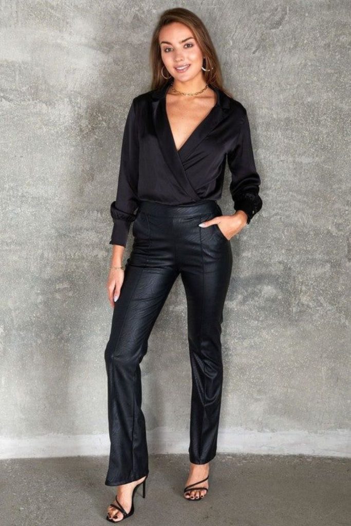 Satin blouse with leather trousers.
