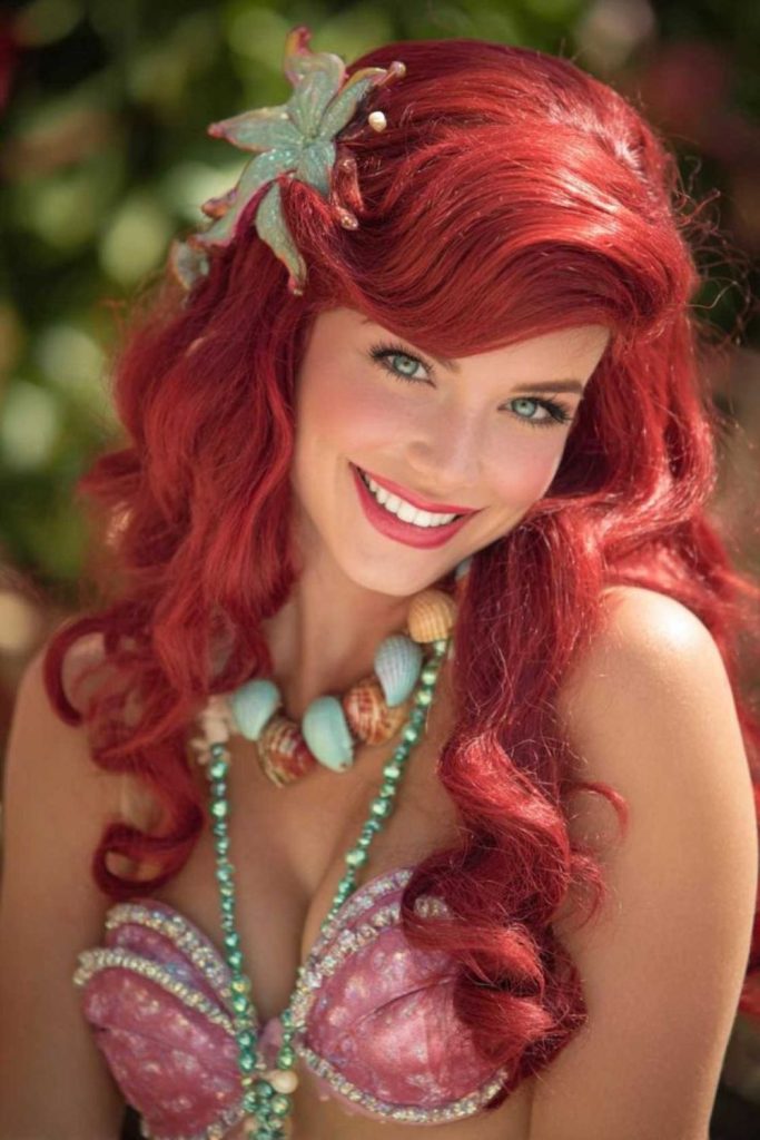 Ruby mermaid queen costume with red hair.