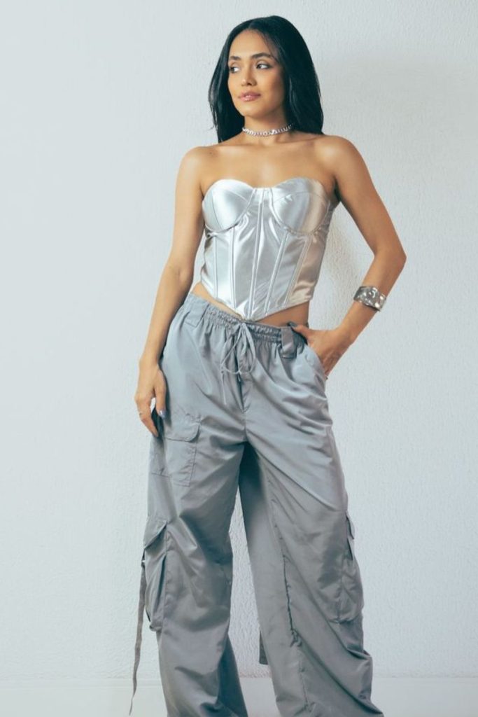 Silver corset with vinyl cargo pants.