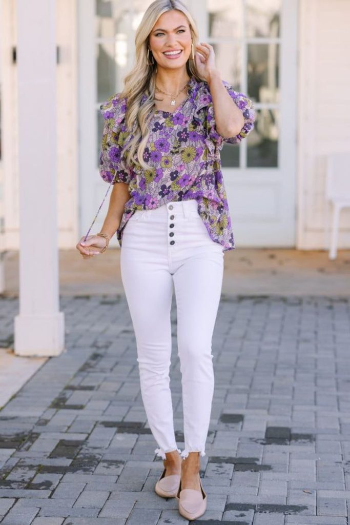 Lavender blouse with white jeans.
