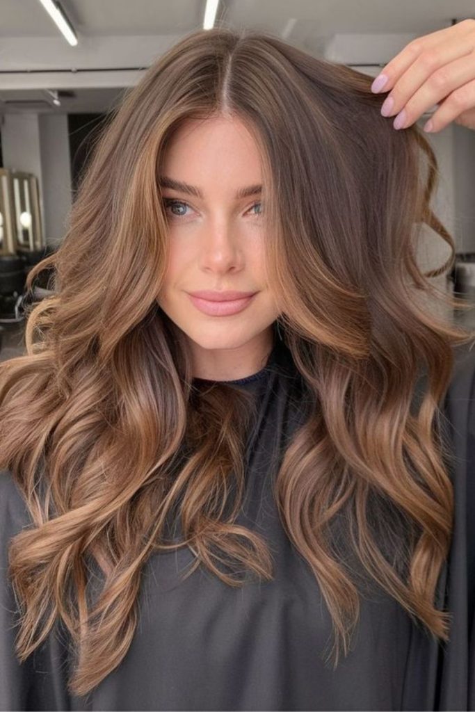 Toasted almond teddy brown hairstyle.