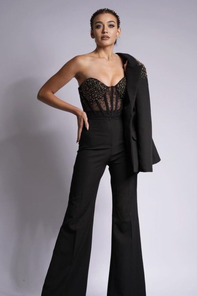 Velvet corset with flared pants.