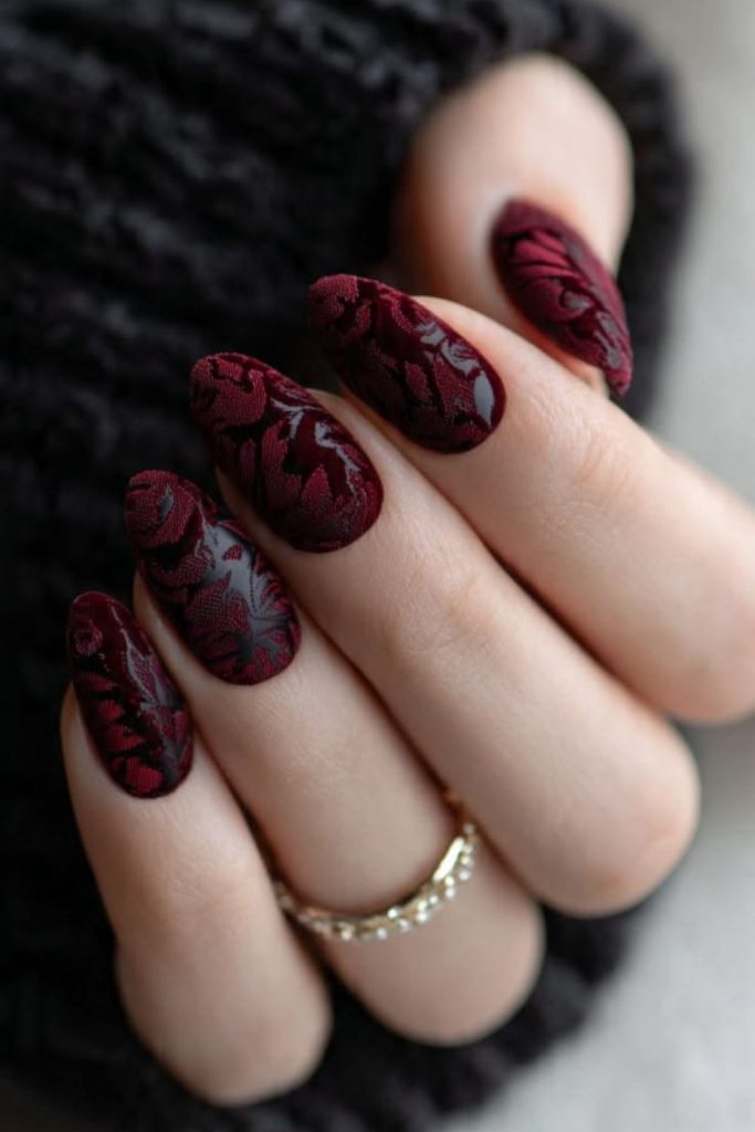 Deep velvet oxblood glossy manicure.