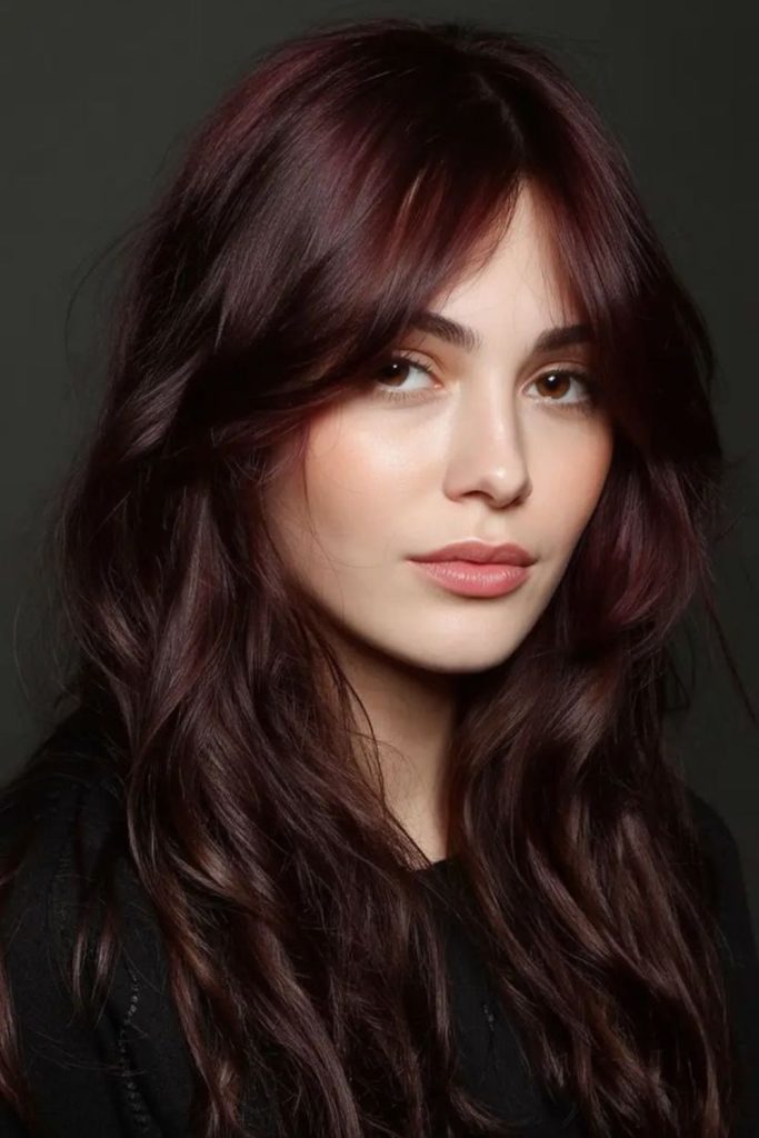Deep velvet plum brunette hair.