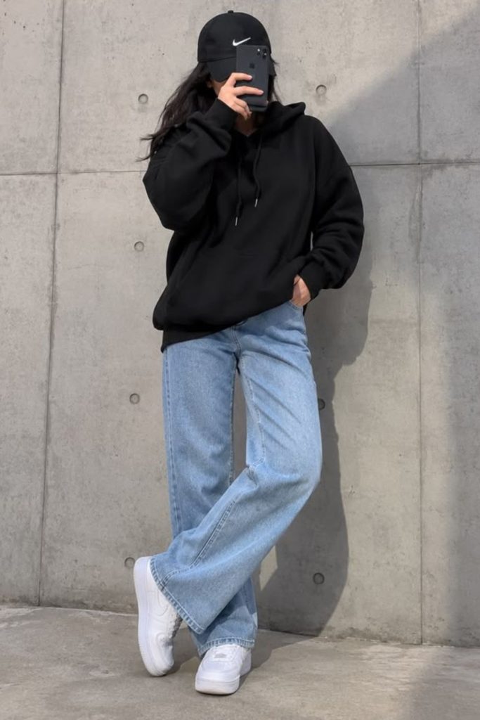 Hoodie with relaxed-fit denim jeans.