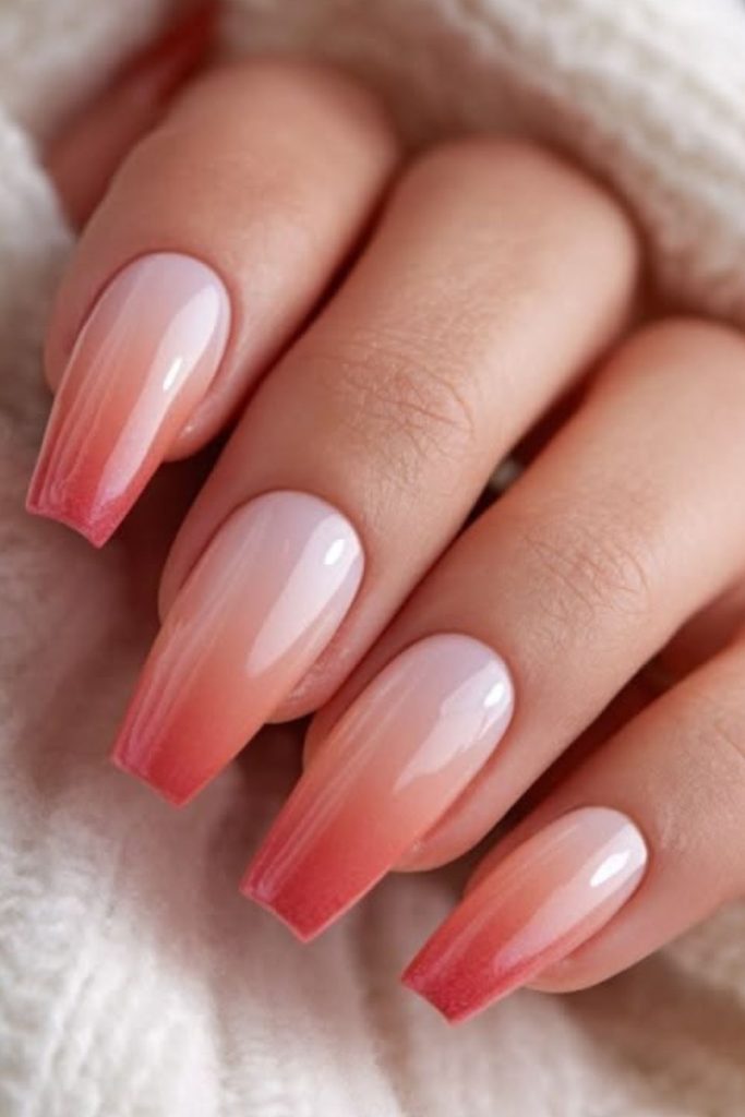 Peach shimmer coffin nail design.