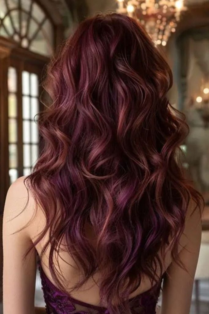Plum copper curls with warm highlights.