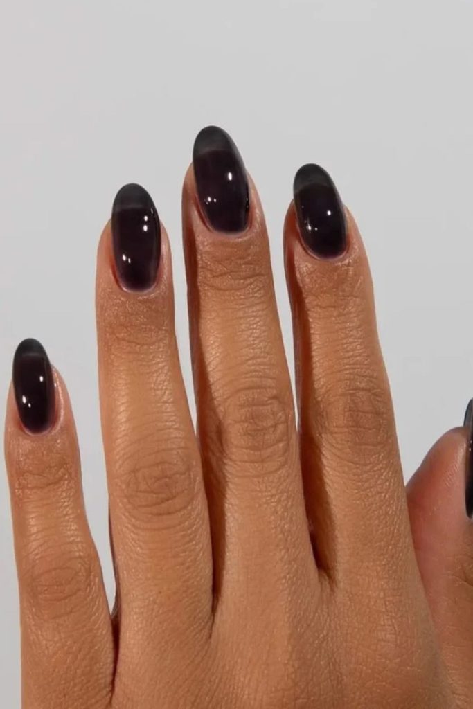 Moody blackcurrant glazed jelly nails.