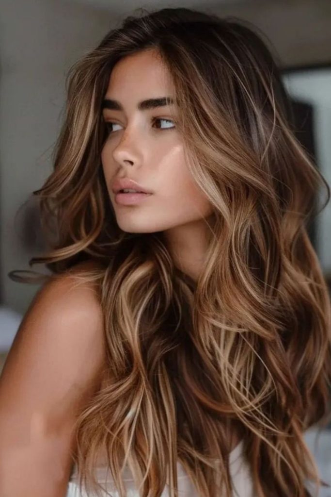 Bronzed bronde hair with sun-kissed highlights.