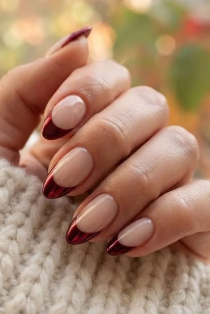 Burgundy chrome French tip nails
