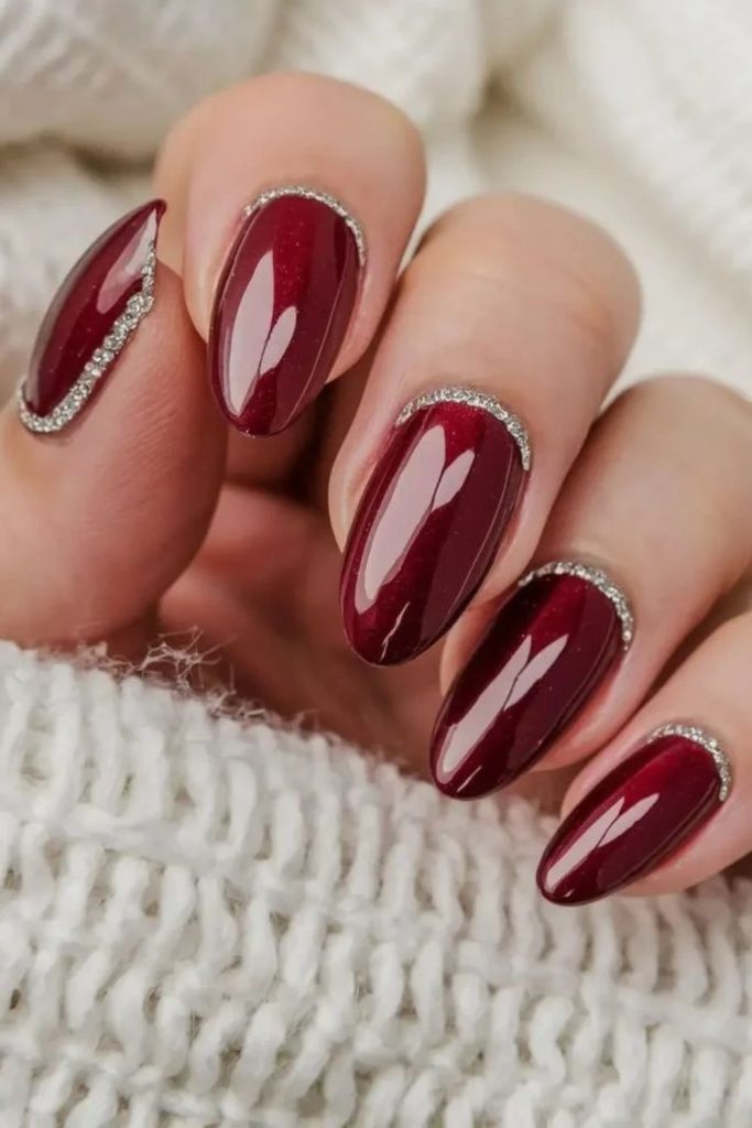 Burgundy crystal embellished manicure design