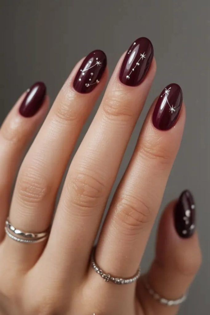 Burgundy galaxy shimmer star nails