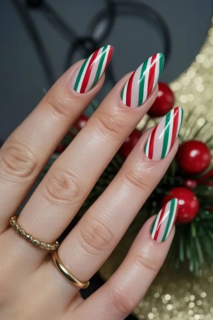 . Red green candy cane nail art.
