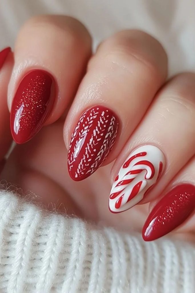 Cozy candy cane sweater inspired nails.