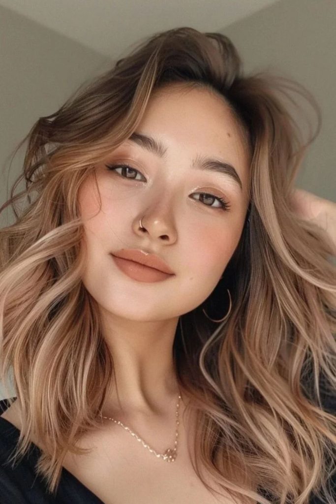 Glossy chai latte brown hair color.