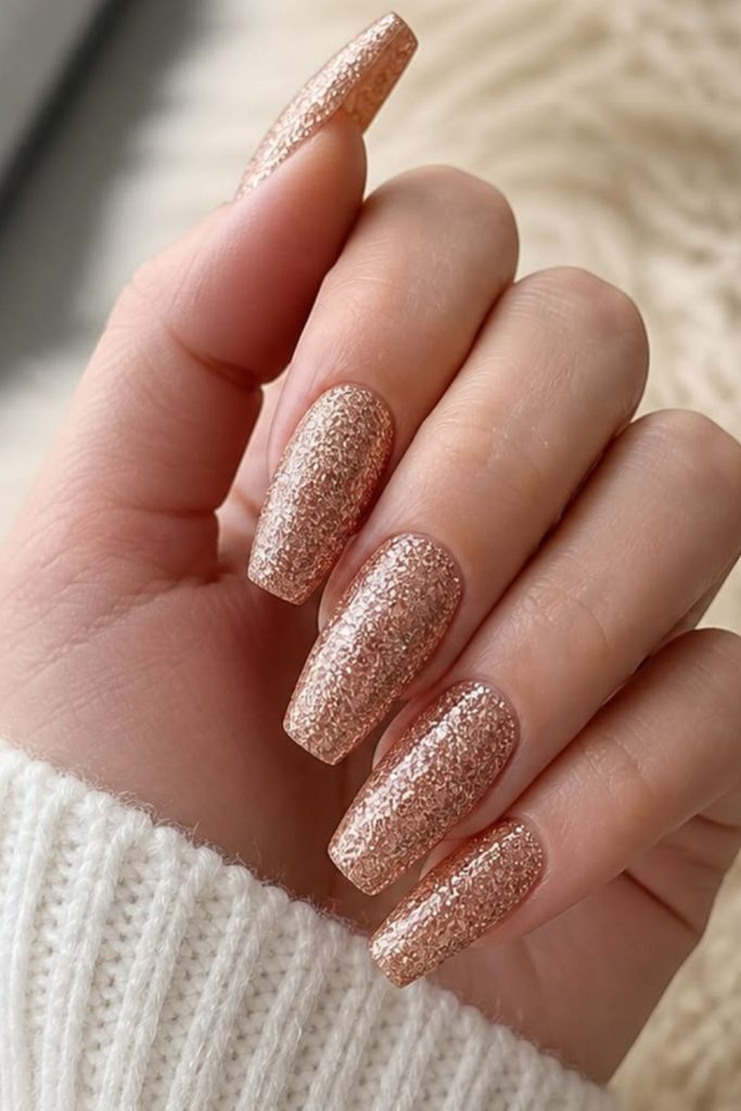 Champagne crystal coffin nail design.