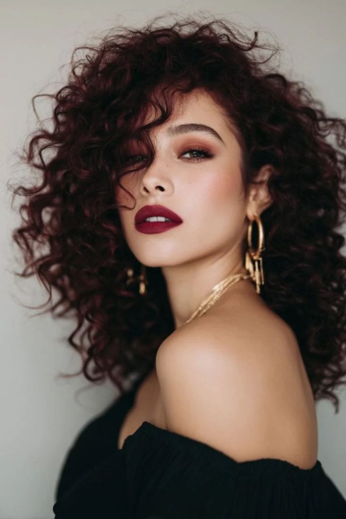 Black cherry noir curly hairstyle