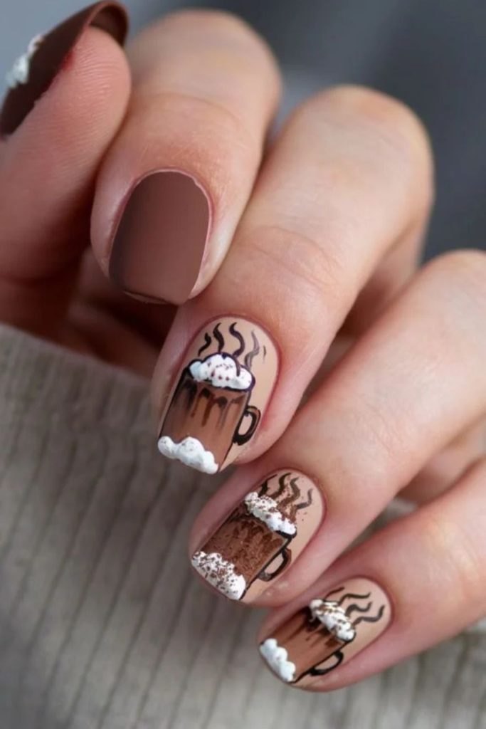 Chocolate nails featuring tiny cocoa mugs.