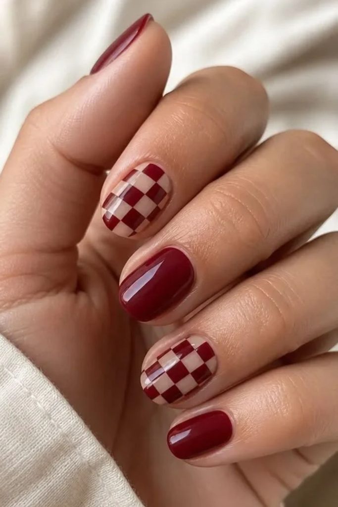 Cranberry checkerboard graphic nail art