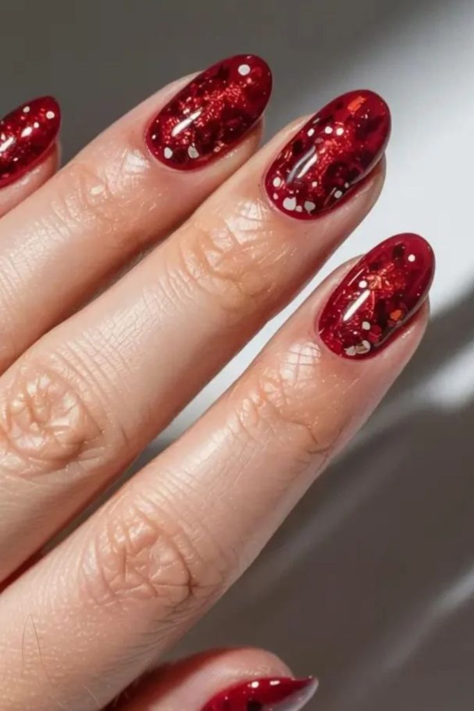 Cranberry metallic confetti nail art