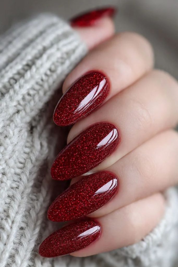 Cranberry glitter cascading nail design