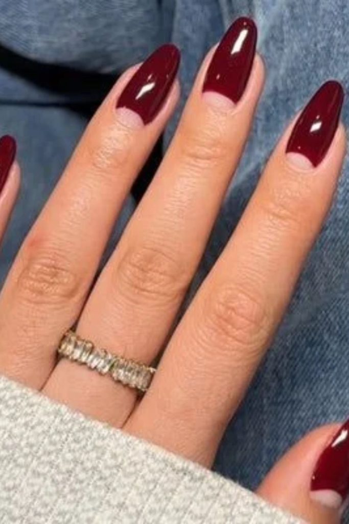 Cranberry half-moon manicure design