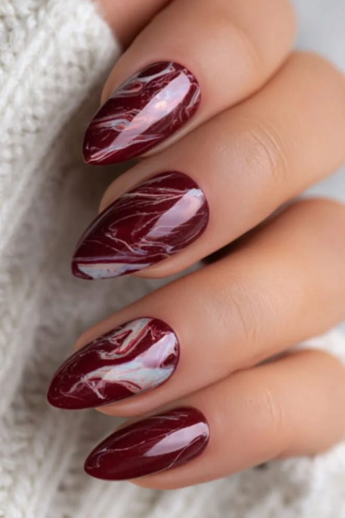 Cranberry marble vein nail design