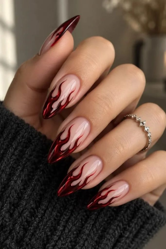 Crimson burgundy flame nail design