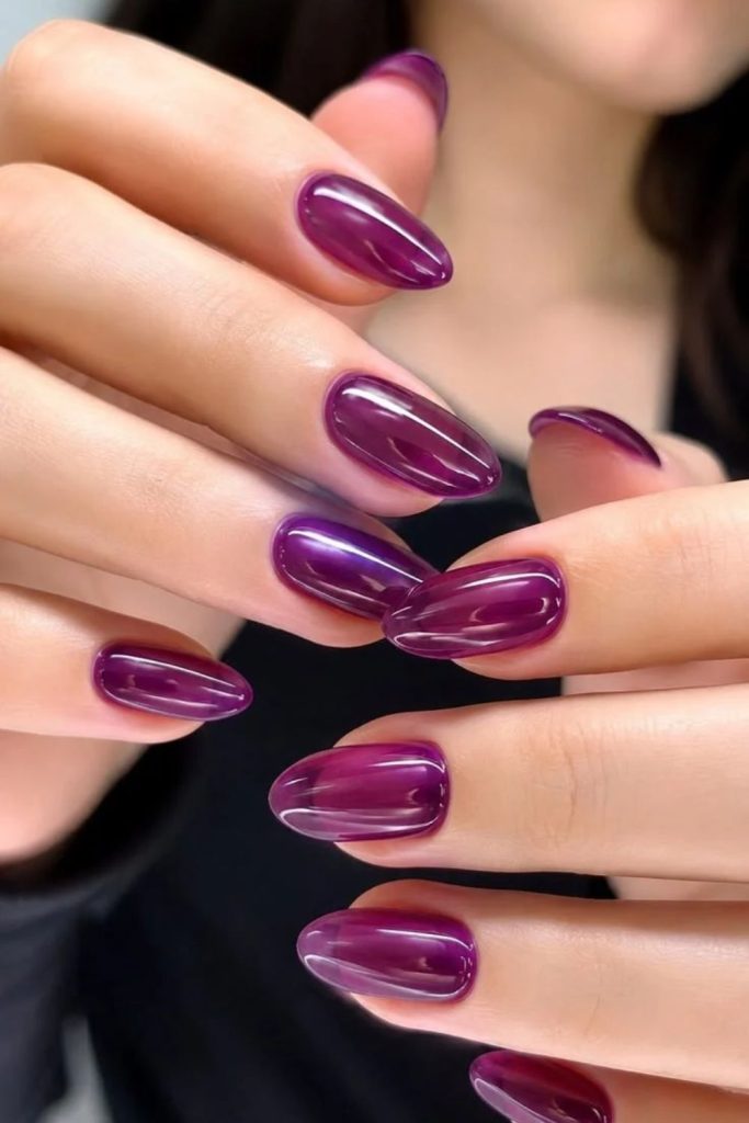 Glossy purple grape jelly nails.