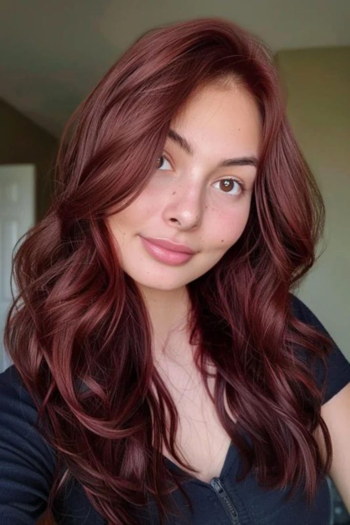 Deep mahogany mermaid waves with crimson.
