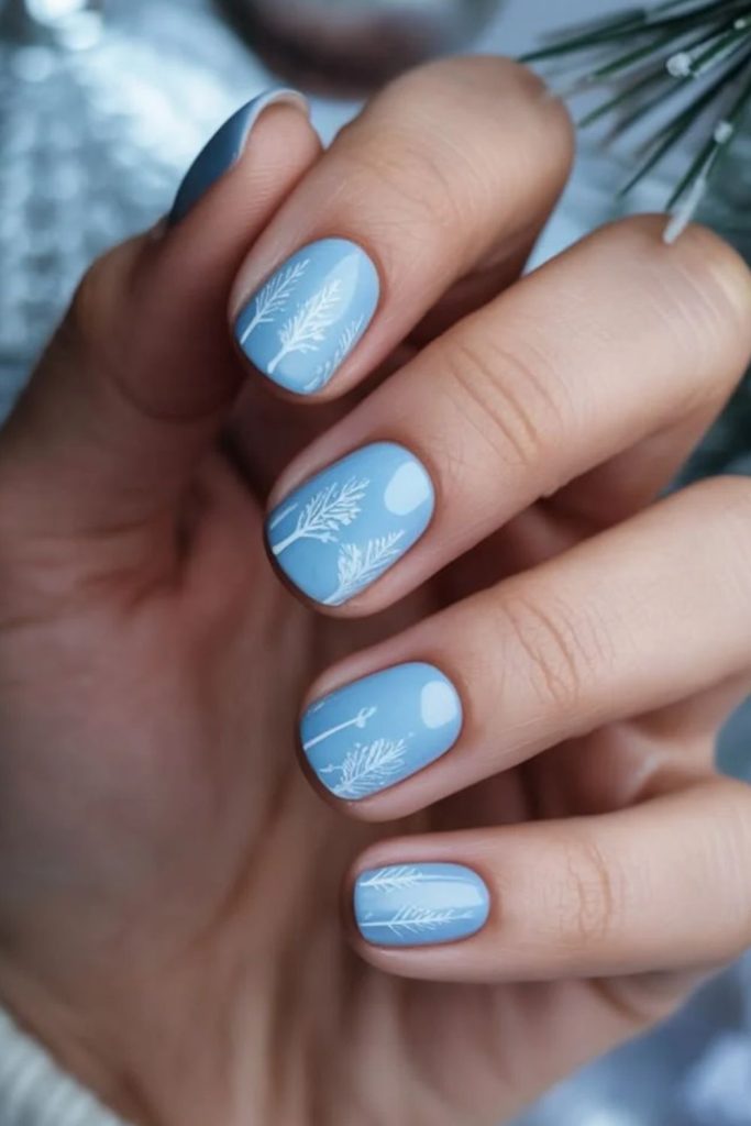 Frosted evergreen winter nail art design.