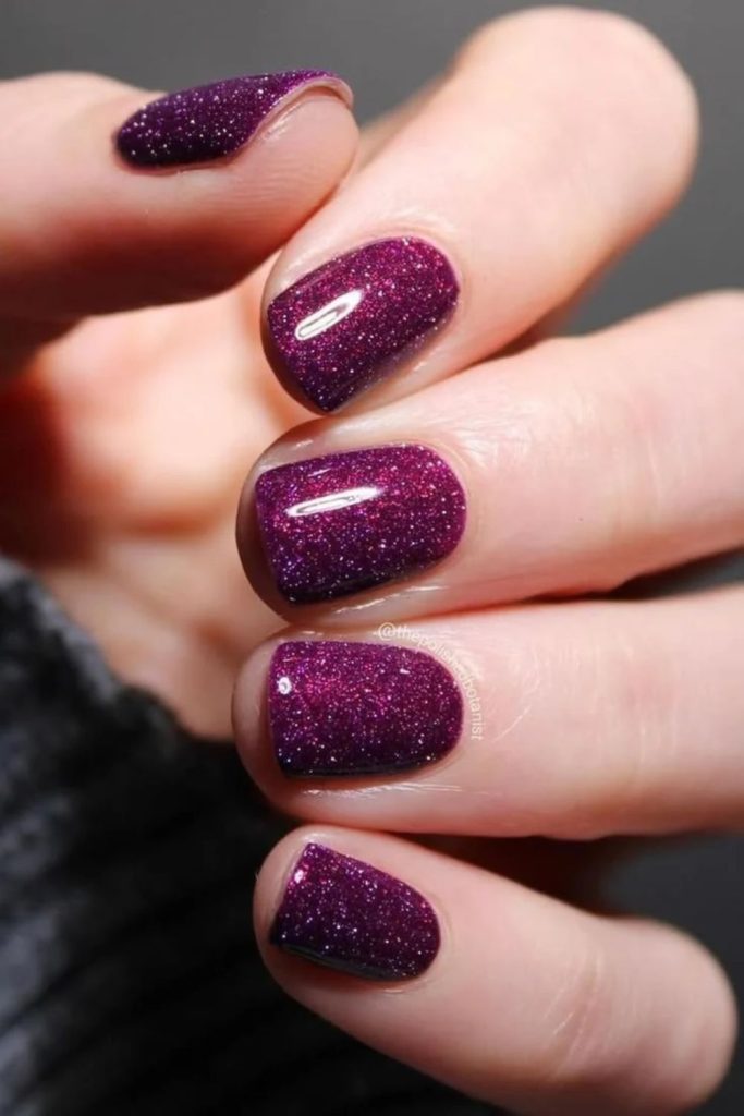 Sparkling frosted sugar plum nails.