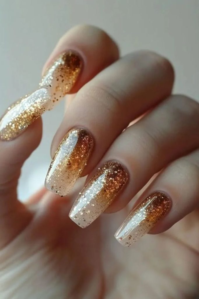 Golden hour shimmer almond nails