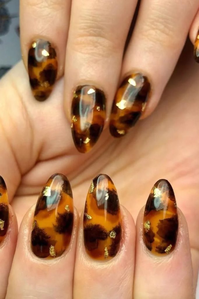 Golden caramel tortoiseshell glowing manicure.