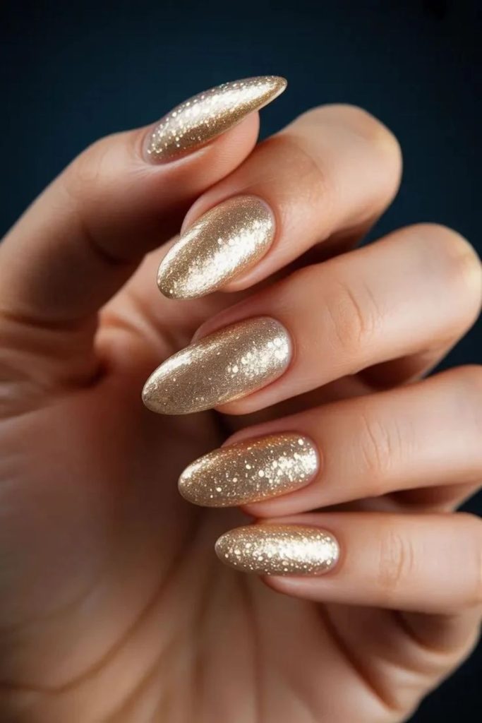 Golden velvet sparkle manicure design