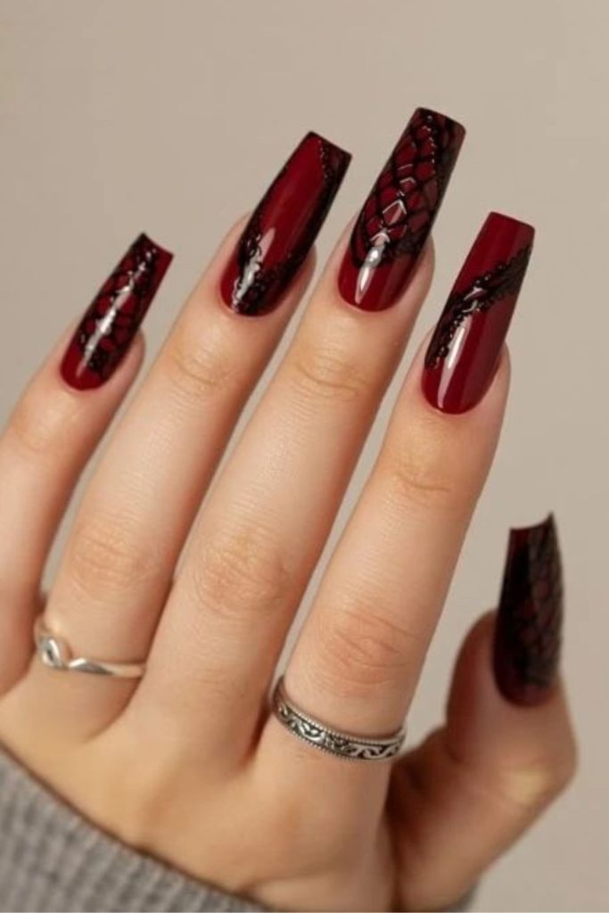 Gothic garnet lace coffin nails.