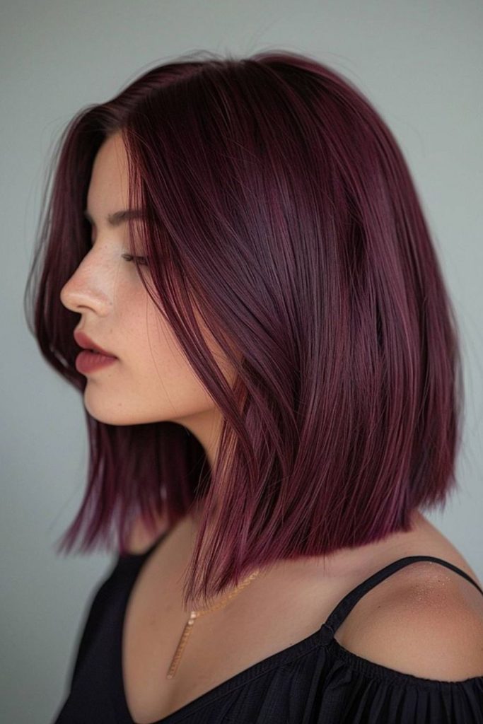 Grape plum velvet sleek bob haircut.