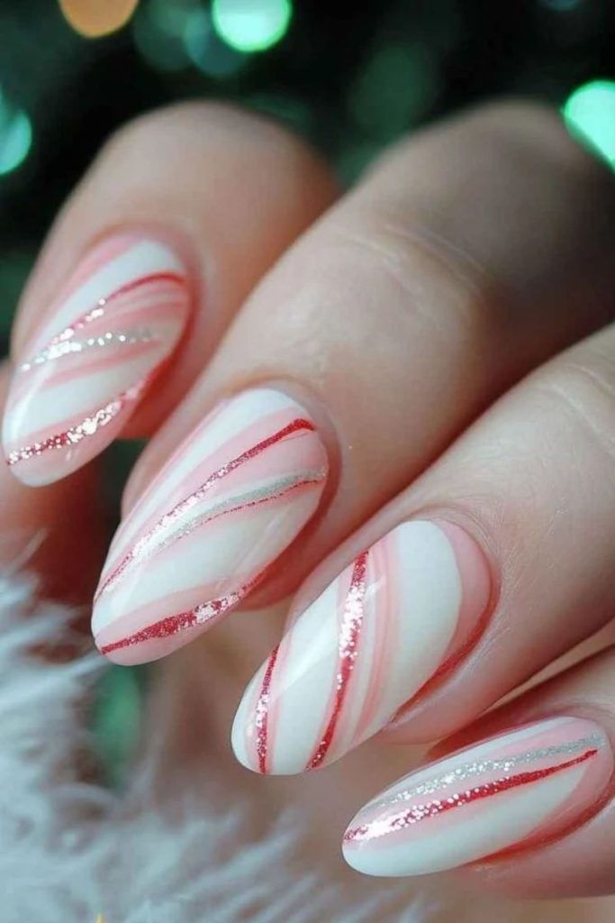 Icy shimmering peppermint Christmas nail design.