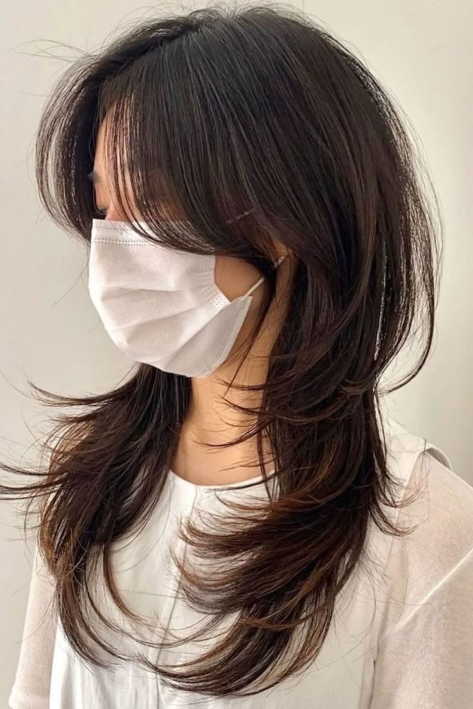 Korean-inspired octopus layers with curtain bangs.