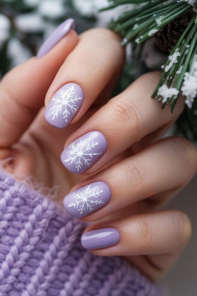 Lavender pastel frosted snowflake nails.