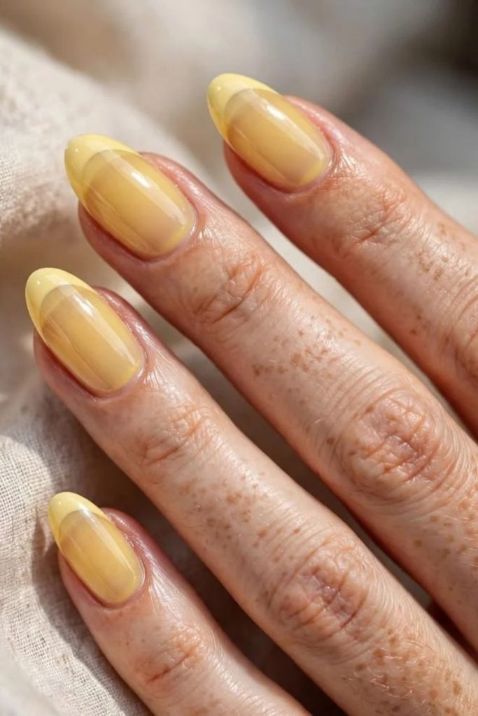 Sparkling lemon yellow jelly nails.